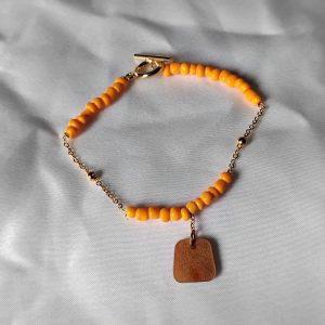 Bracelet perle de rocaille et résine orange