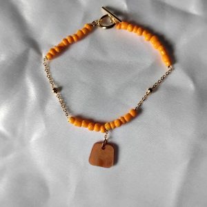Bracelet perle de rocaille et résine orange